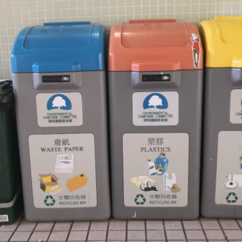 Recycling cabinets of metal, plastics and waste paper on the ground floor